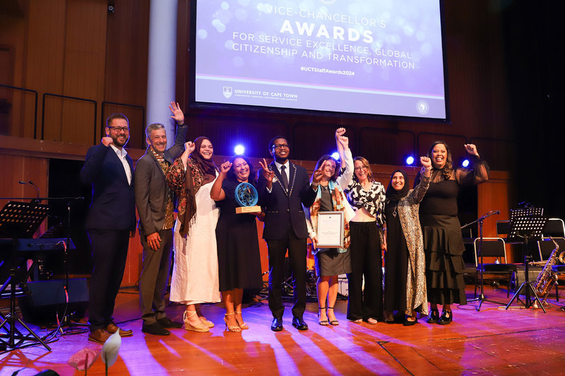 The Institute of Preparedness and Prevention of Pandemics in the Research Office receive their Global Citizenship Award for PASS staff.