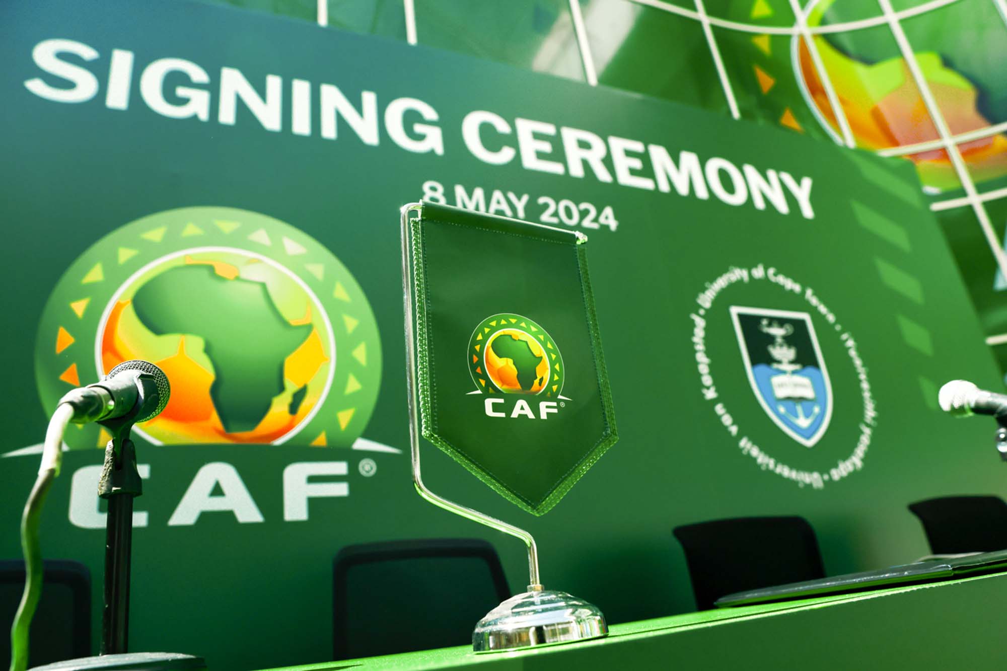 CAF and UCT branding at the signing ceremony in Cairo, Egypt.